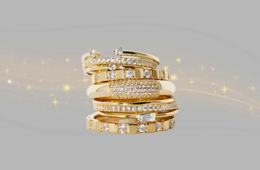 gold ana luisa rings with diamonds stacked on top of each other