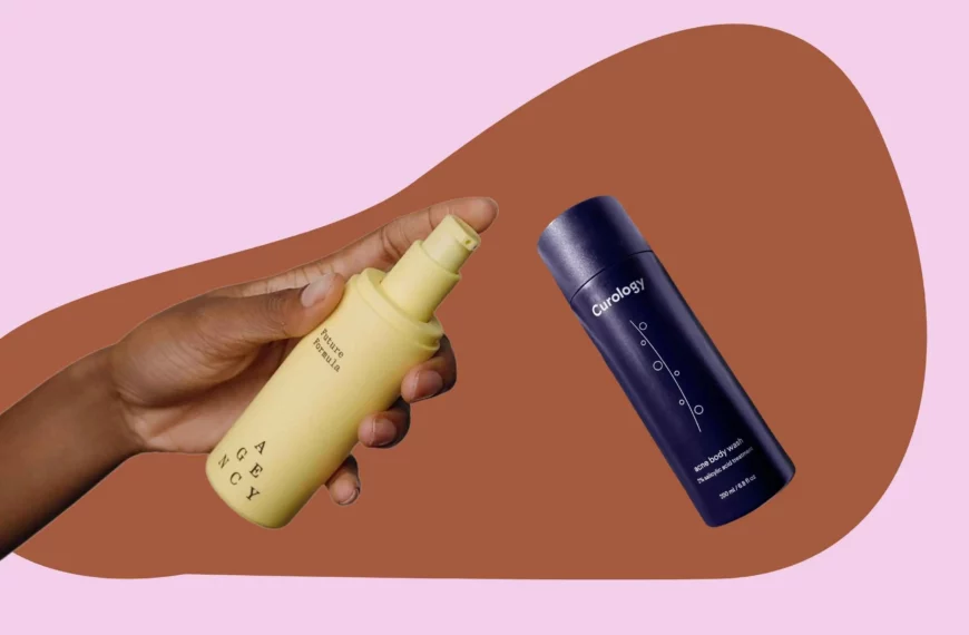 outstretched hand holding a yellow agency skincare bottle with a blue curology bottle beside it