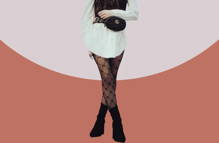 lower half of woman wearing a white shirt, Gucci belt bag, Gucci tights, and black boots