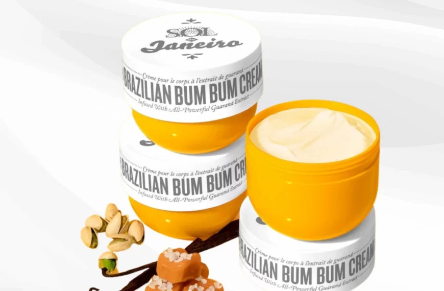 3 orange jars of Brazillian bum bum cream, 2 stacked together and 1 with the lid off