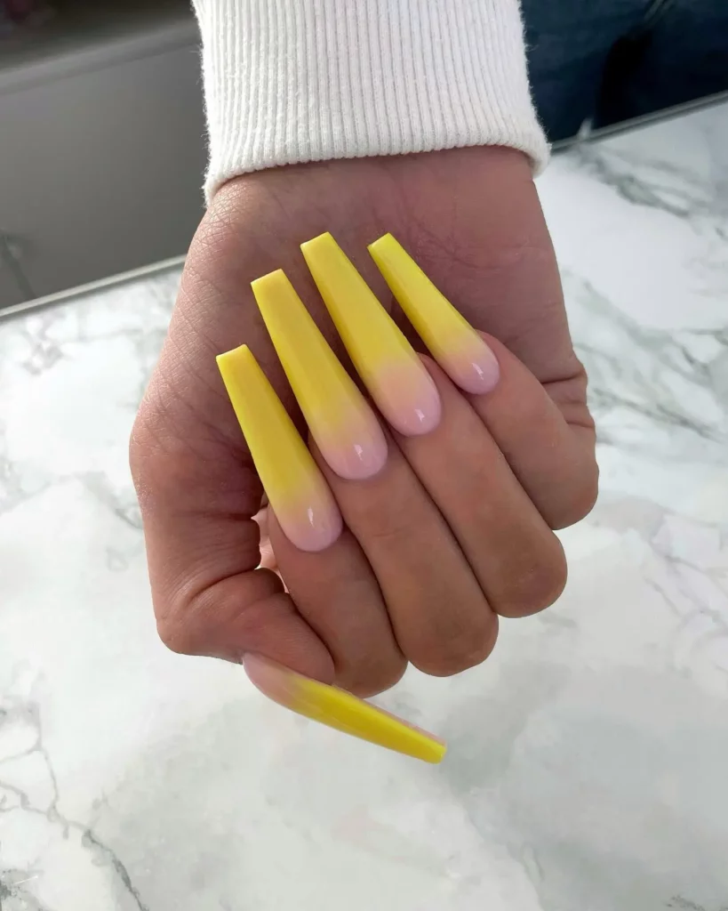 Yellow Nail Ideas with marble background 
