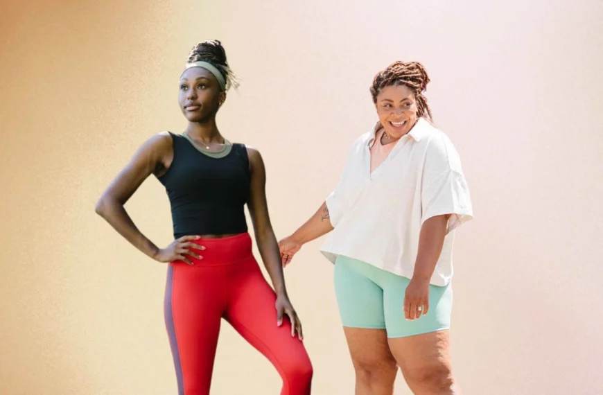 woman wearing red top, black leggings from Zyia, and a woman wearing white top, blue shorts from Athleta