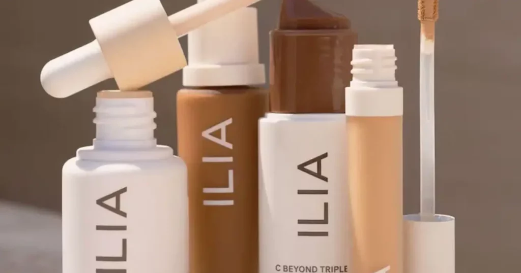 bottles of white and nude-colored bottle of Ilia Beauty products