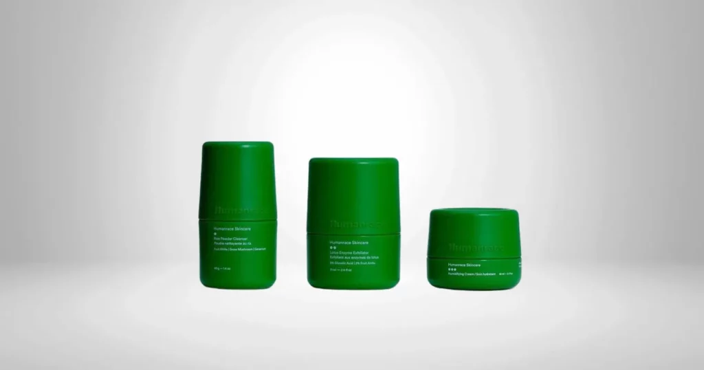 3 green bottles of Humanrace Skincare products