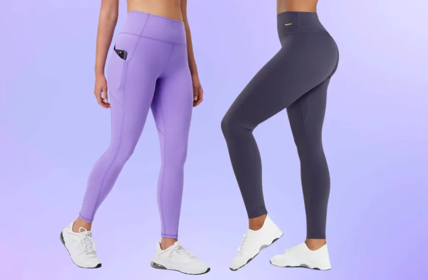 closeup of two people's lower half, one wearing purple Fabletics leggings and white shoes, the other wearing gray Gymshark leggings and white shoes