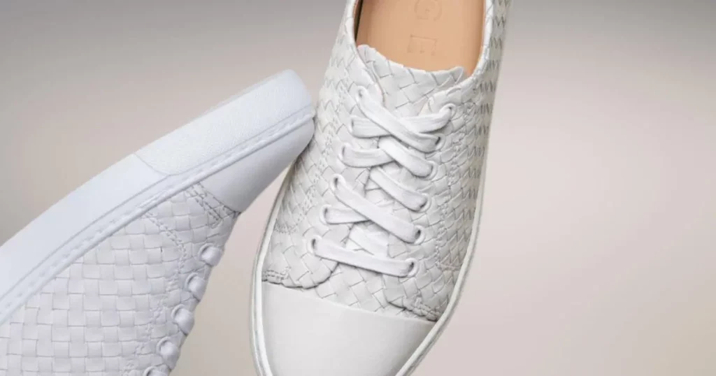 pair of white m gemi sneakers