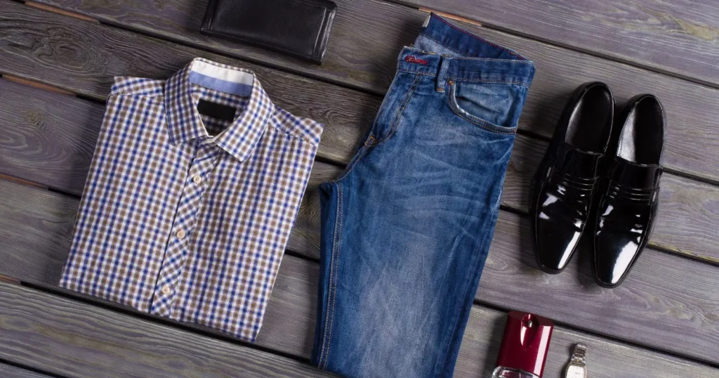 men's designer clothing: dress shirt, jeans, black shoes